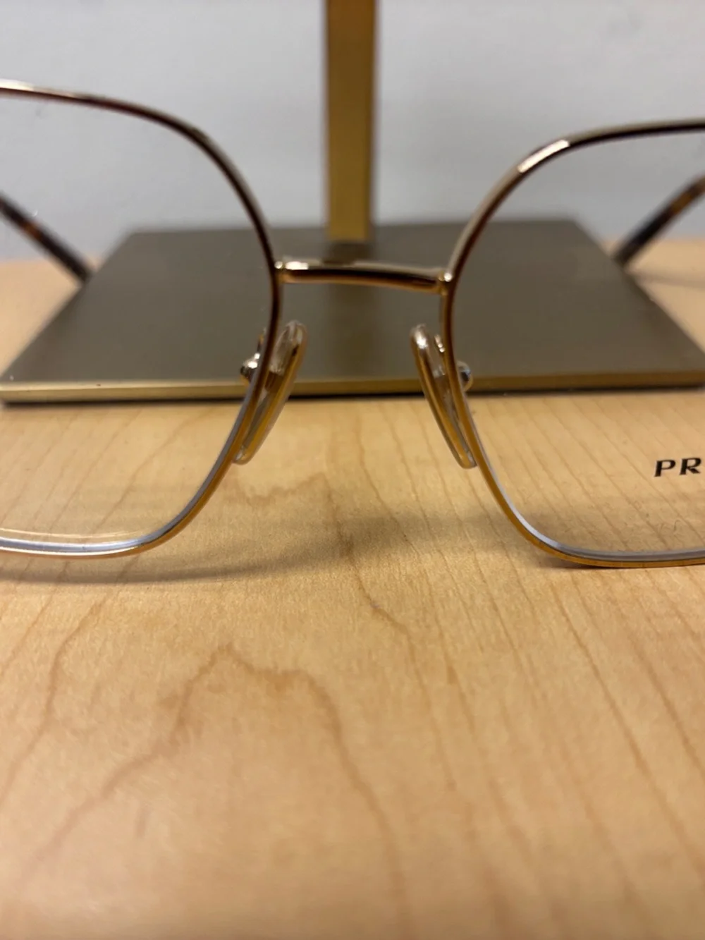Prada Women's Gold Metal Frame Glasses with Clear Lenses